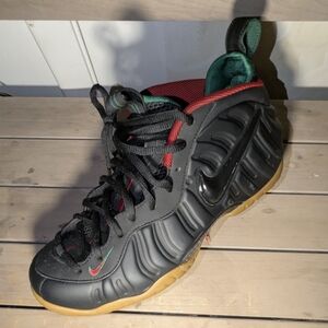 Nike Black and Red Foamposite Sneakers